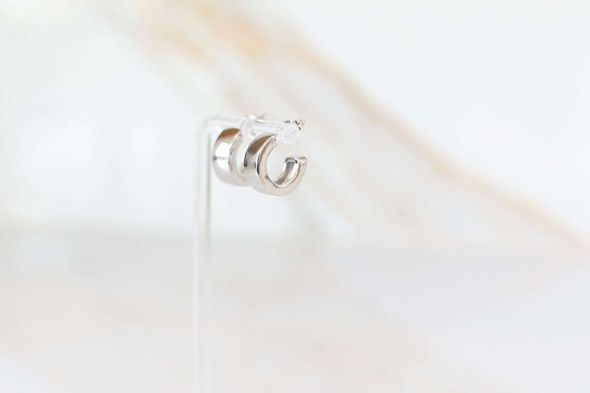 Thick Huggie Hoops in Silver