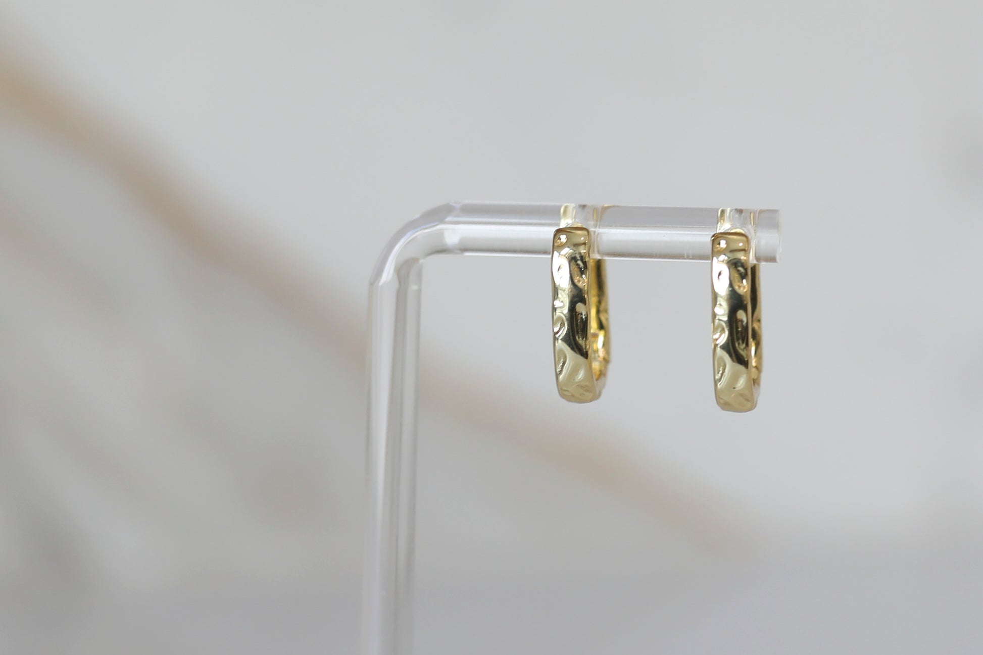 Hammered Huggie Hoops in Gold