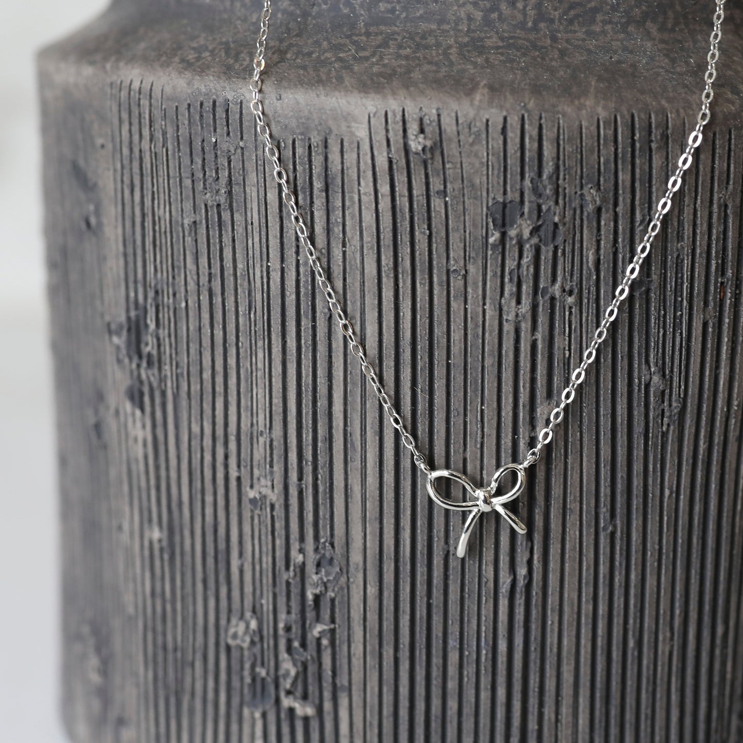 Mini Bow Necklace in Silver