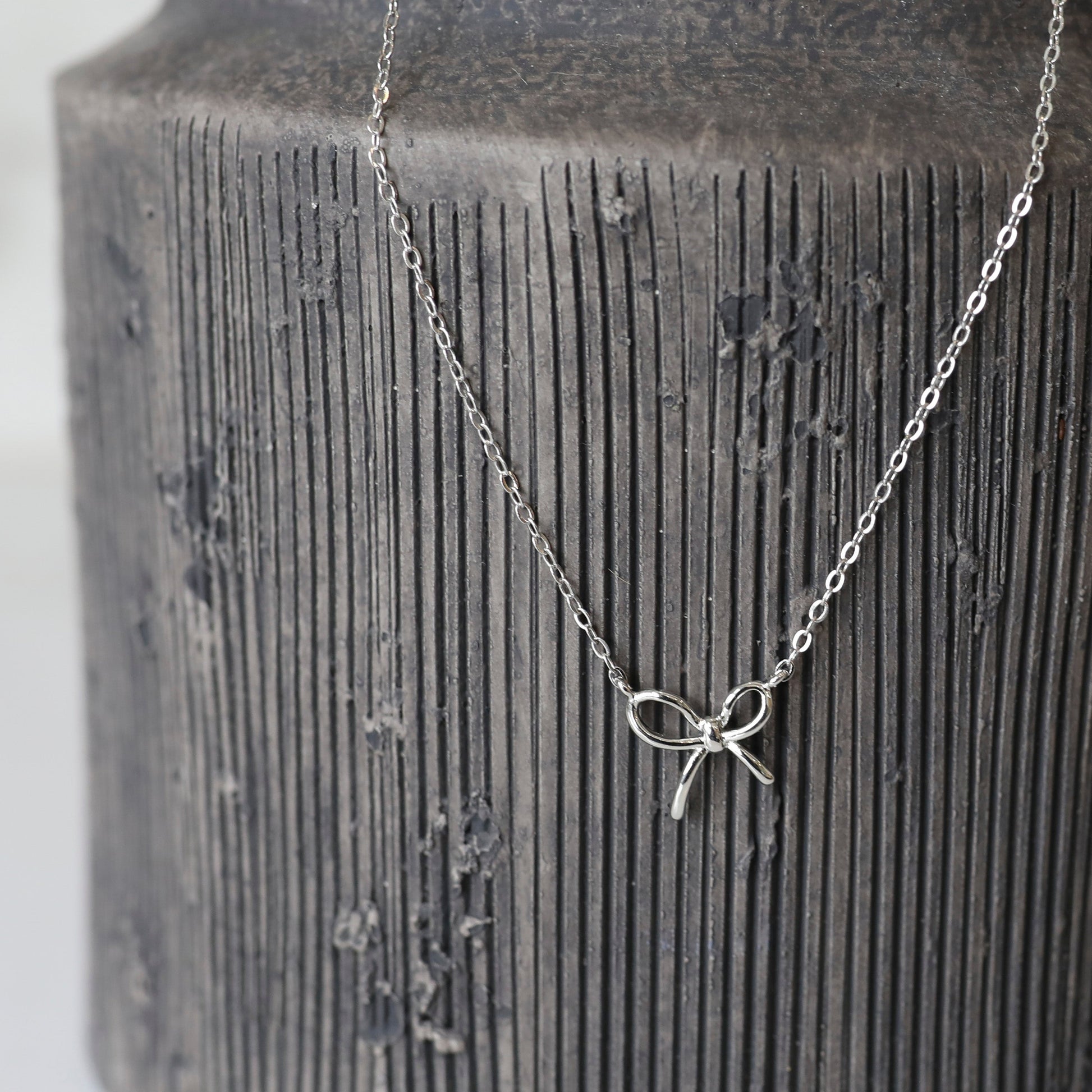 Mini Bow Necklace in Silver