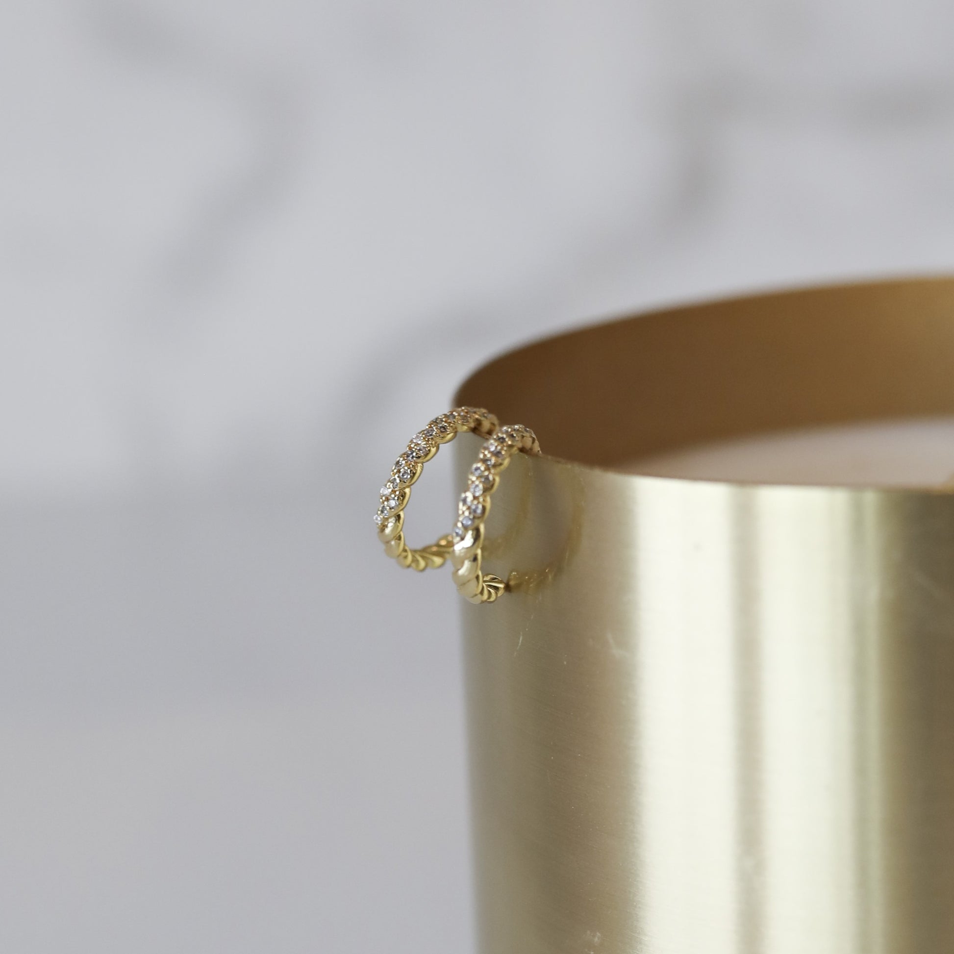 Thin Braided Cubic Zirconia Hoop Earrings in Gold - available in two sizes