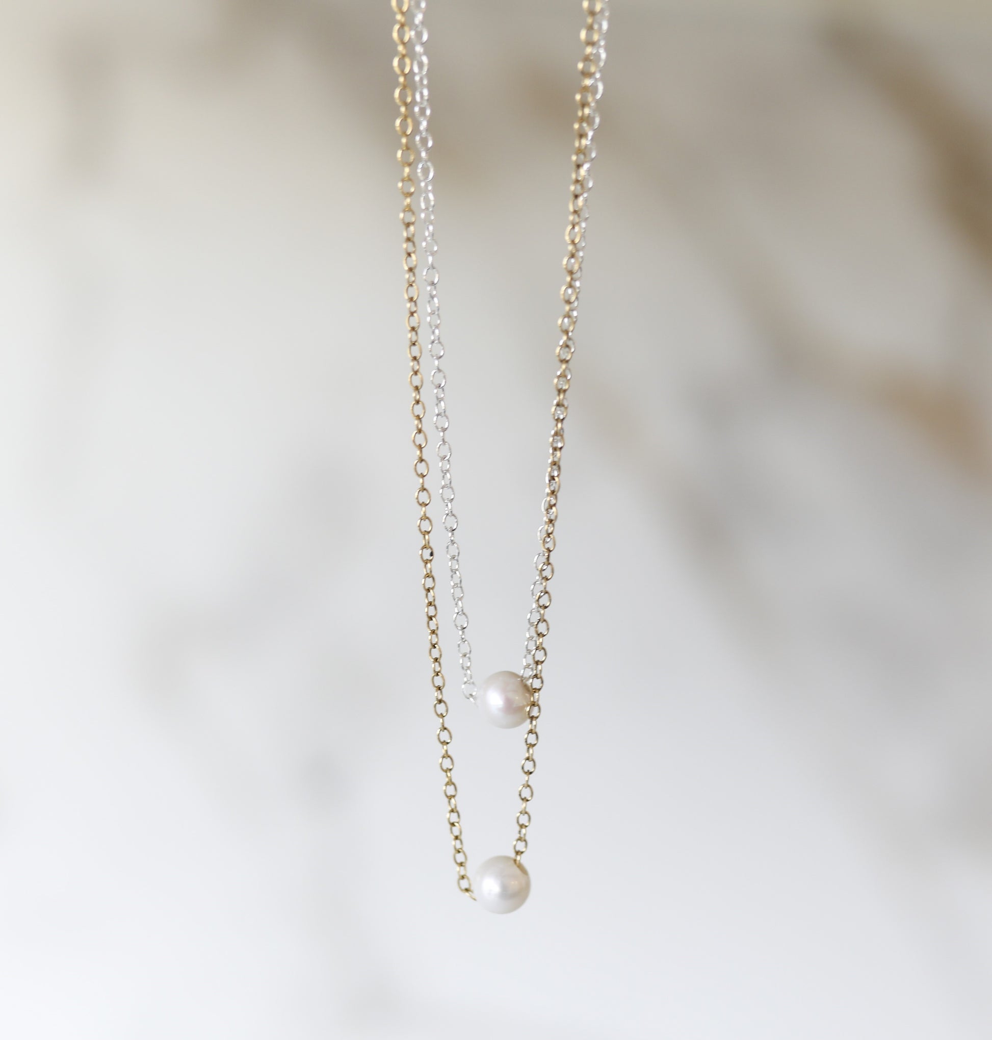 Harmony Necklace with an Akoya Pearl available in Gold and Silver