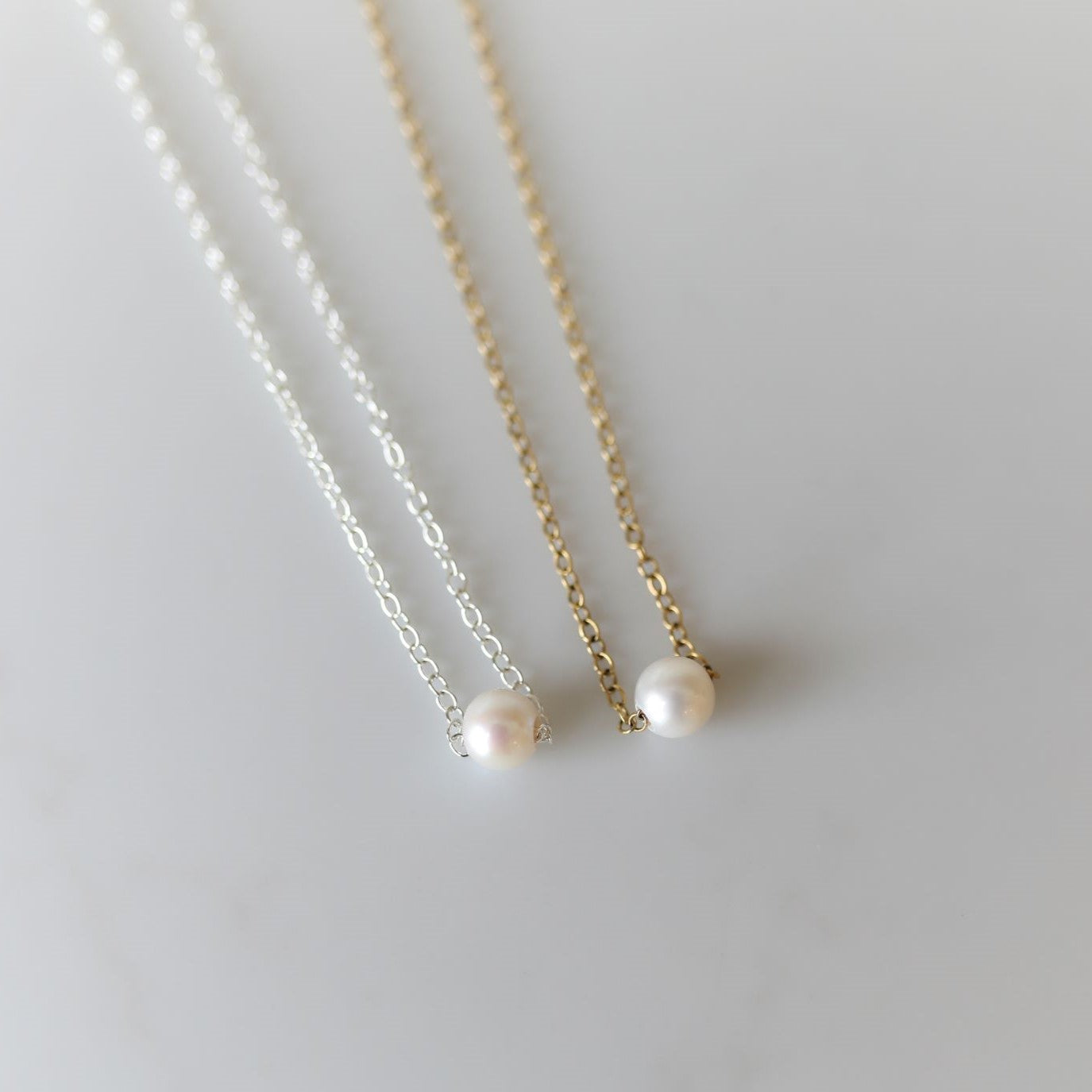 Harmony Necklace with an Akoya Pearl available in Gold and Silver