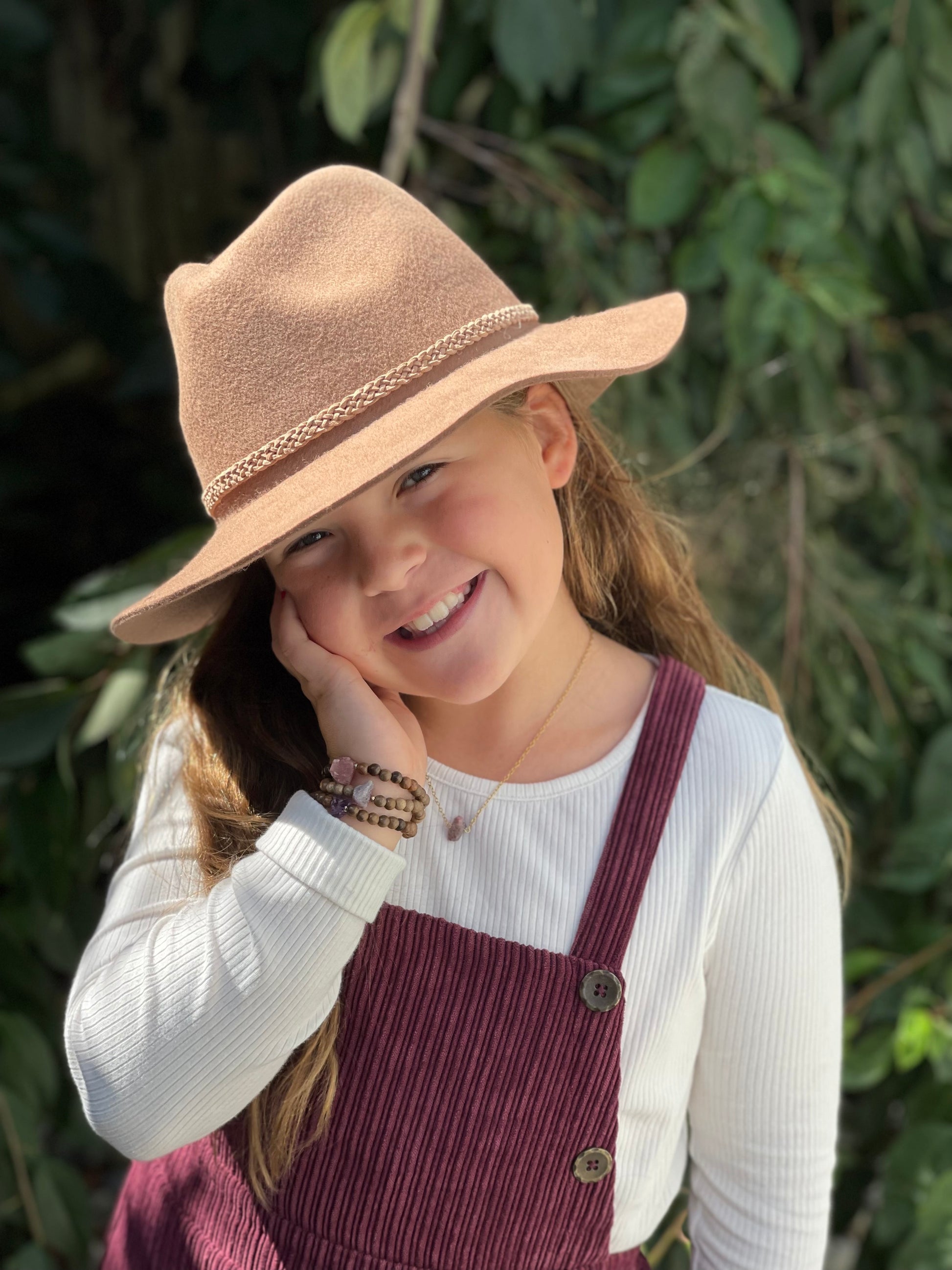 Raw Beauty Bracelets for Littles made with Raw Gemstones modeled by Haddie