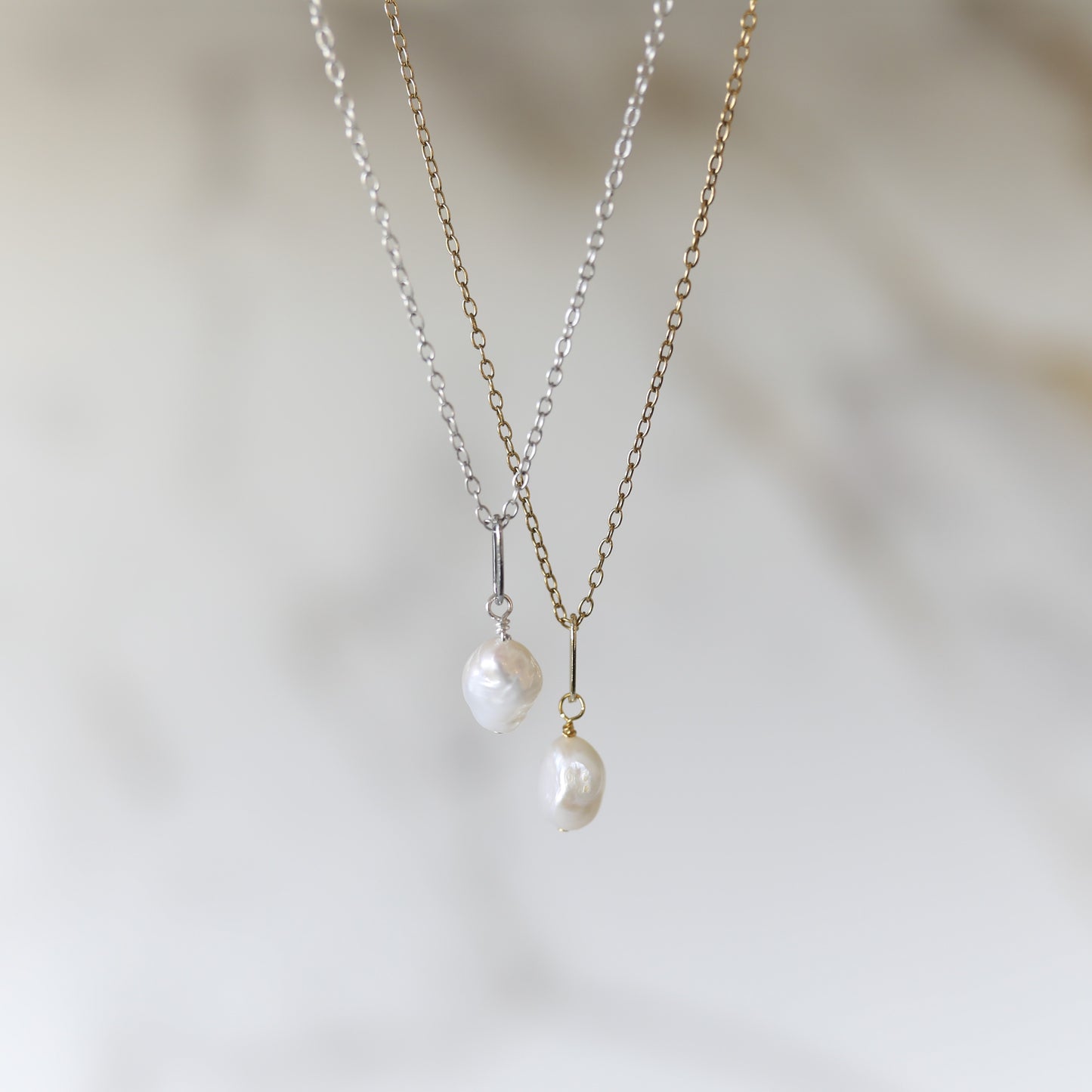 Good Luck Necklace with a Freshwater Pearl available in Gold or Silver