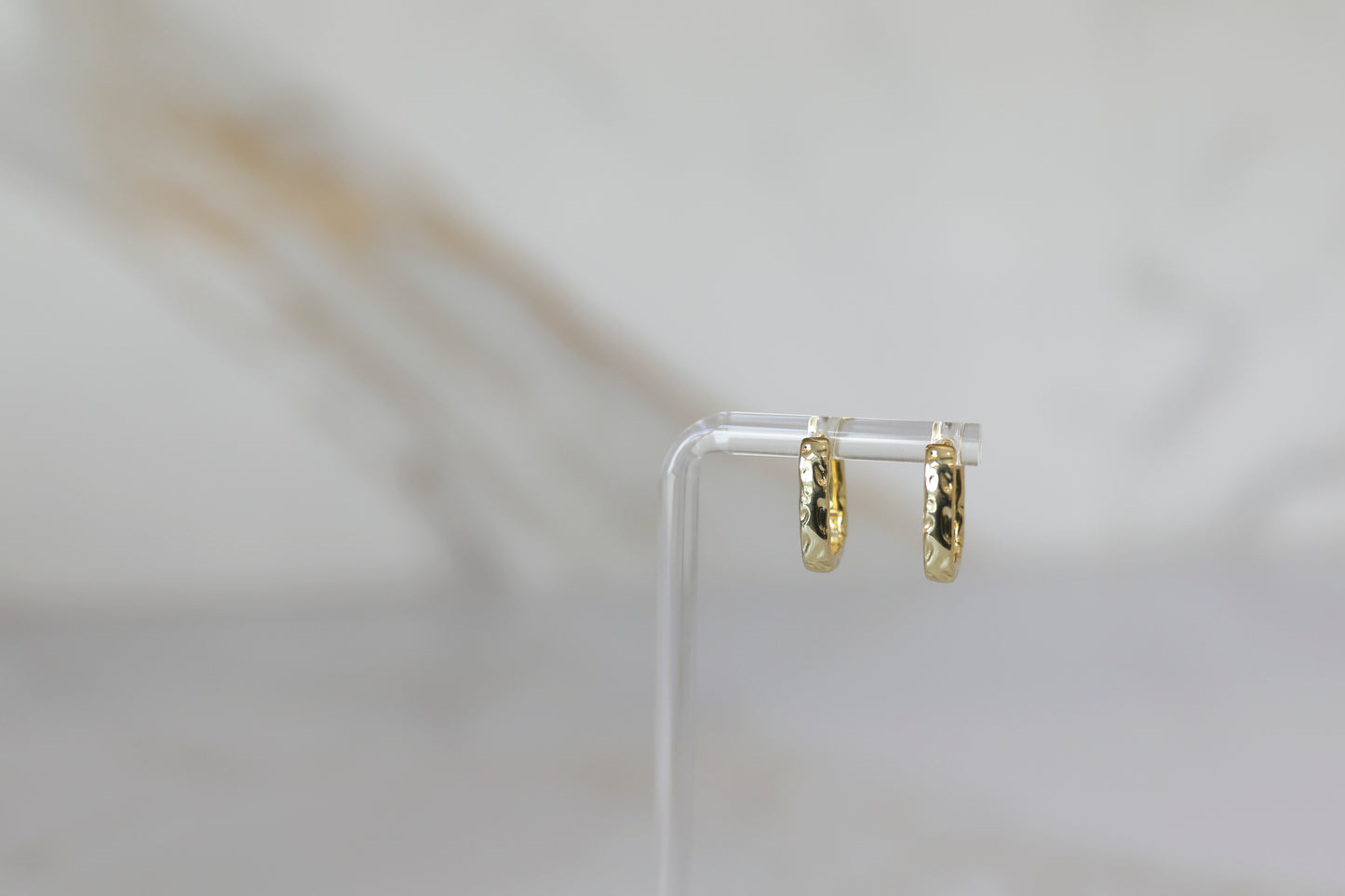 Hammered Huggie Hoops in Gold