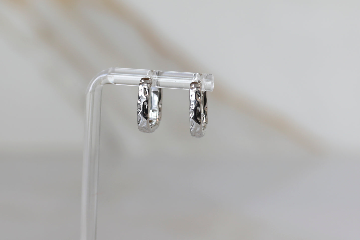 Hammered Huggie Hoops in Silver