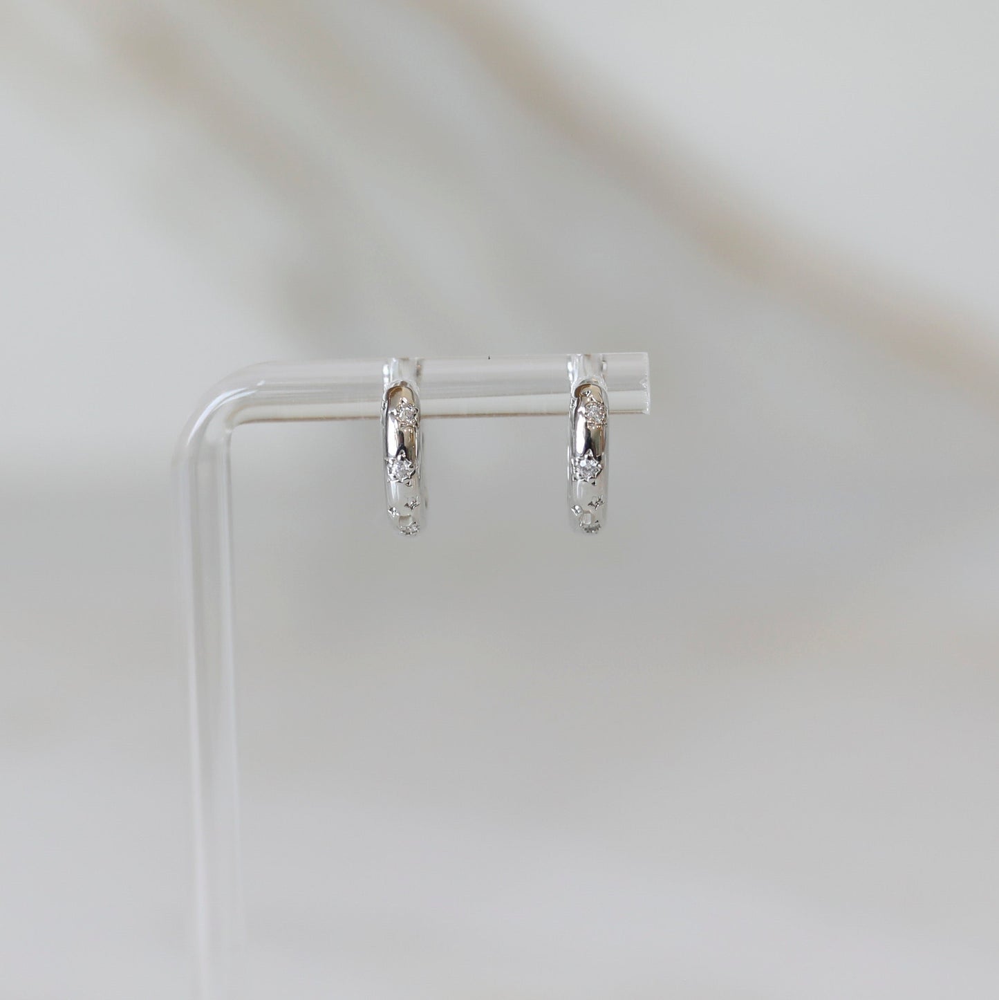 Pave Star Huggie Hoop Earrings in Silver