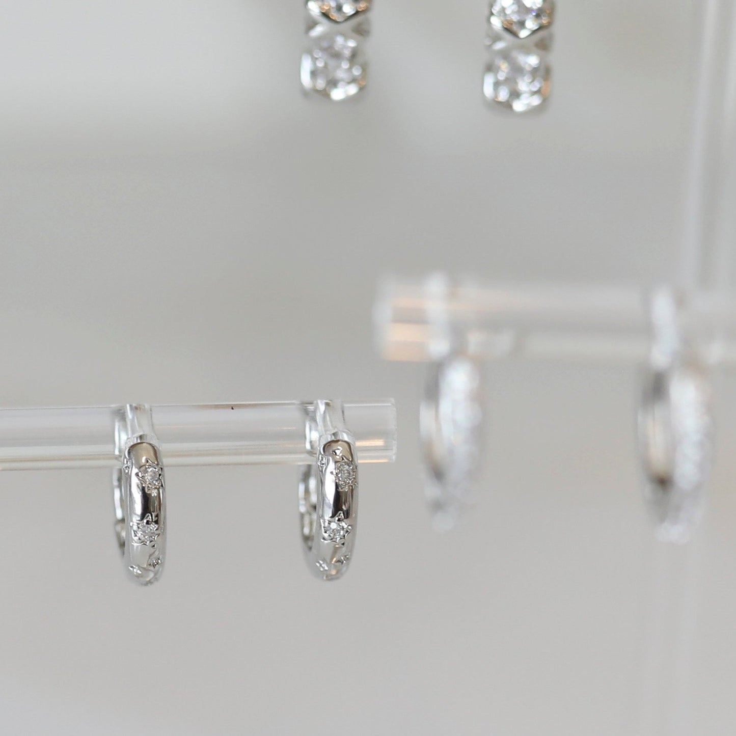 Pave Star Huggie Hoop Earrings in Silver