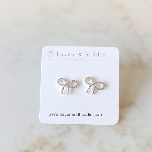 Cubic Zirconia Bow Stud Earrings in Silver