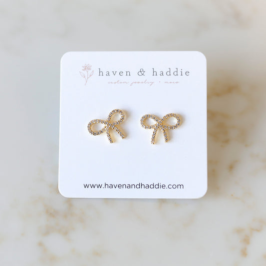 Cubic Zirconia Bow Stud Earrings in Gold