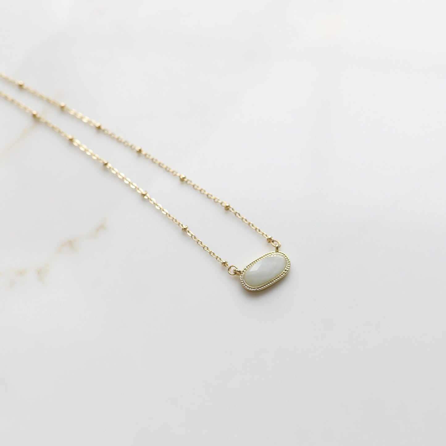 Meaningful Gemstone Necklace in Aquamarine available with a Gold or Silver chain